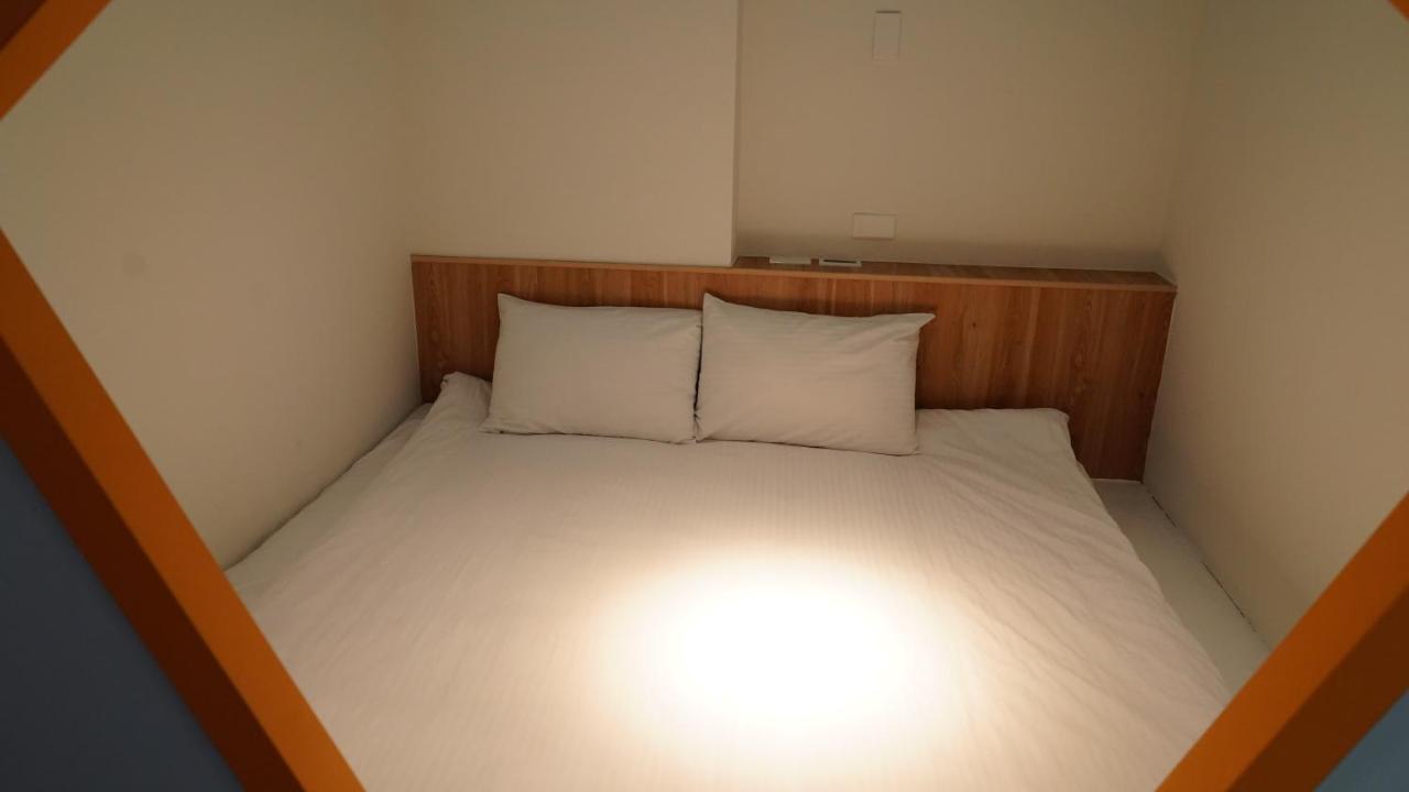 Kaohsiung Time's Hotel Bagian luar foto